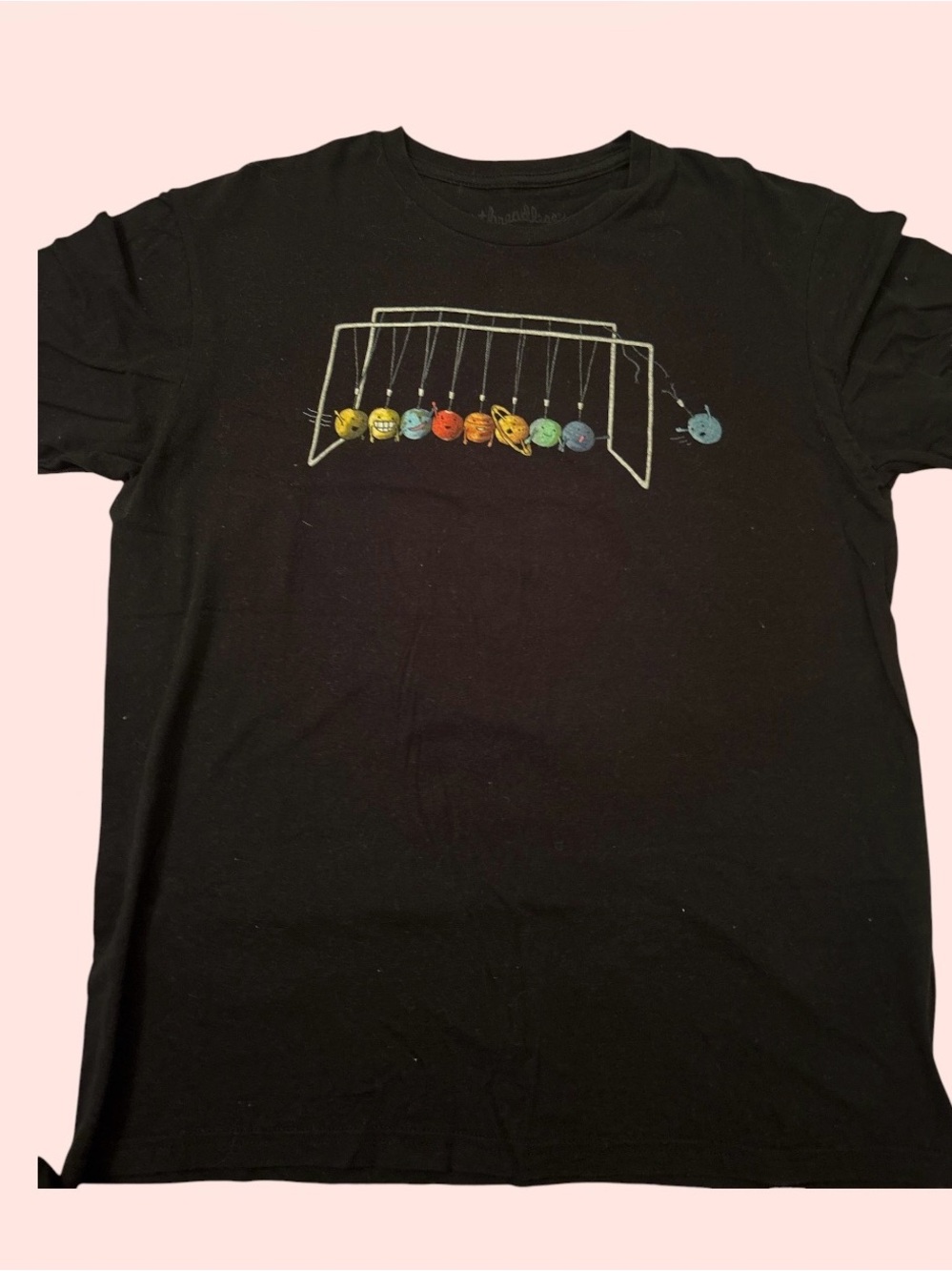 Threadless Black Tee with Colorful Planetary Newton's Cradle